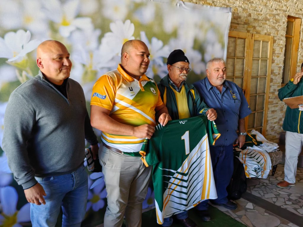 Photo: Archie Josias presenting his son Eschelle with his playing shirt before the derby game vs Wesbank. Photo by Abbotsdale Rugby Media 