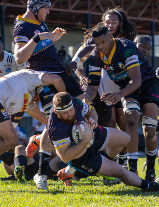 Photo: Llewellyn Classen (ball in hand) and Marlyn Williams of the Sanlam Boland Kavaliers against the DHL Stormers XXIII in a warm-up match ahead of the 2026 Carling Currie Cup competition. Wellington, Western Cape. 04 July 2026. Photo by Sideline Frames/Kurshé-Lee Brandt
